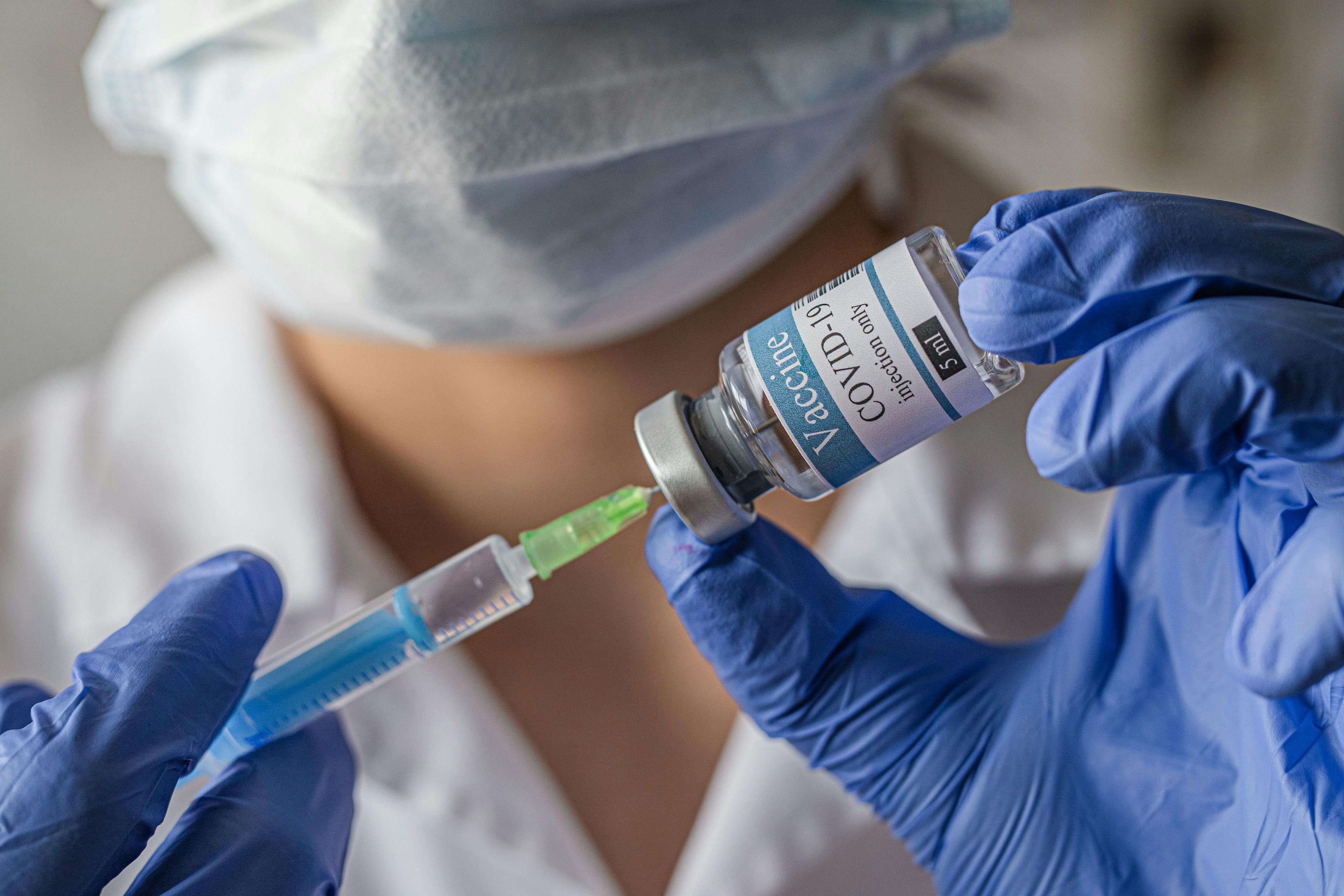 Vial, covid-19, coronavirus vaccine ampoule, bottle for injection with syringe - Image credit: myskin | stock.adobe.com