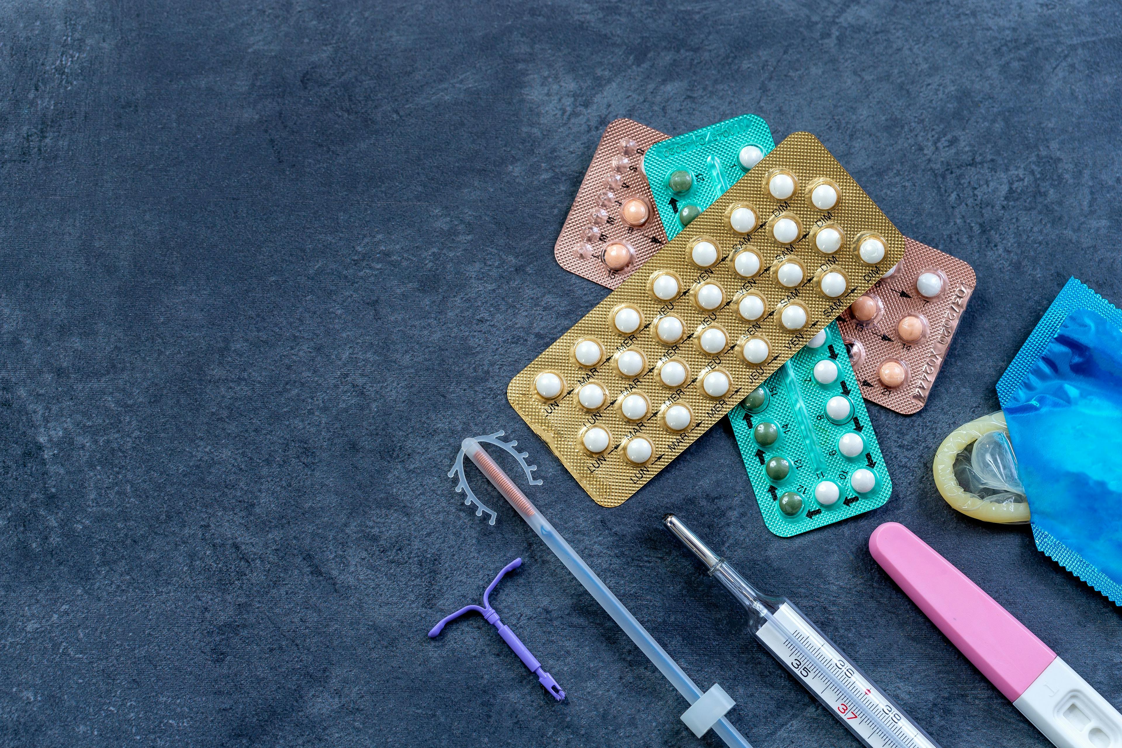 Image credit:  JPC-PROD | stock.adobe.com - Choosing method of contraception : Birth control pills, an injection syringe, condom, IUD-method, on grey