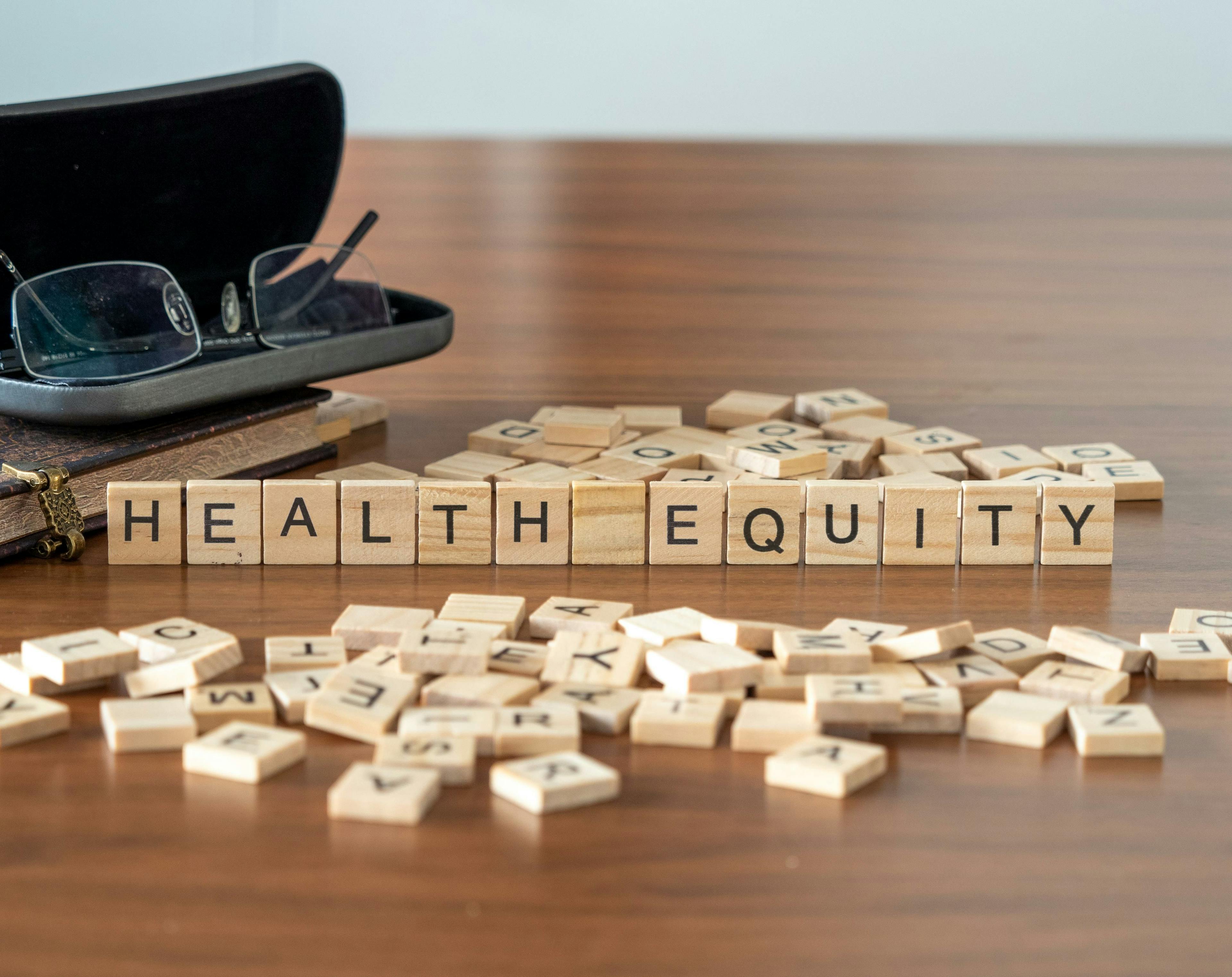 Health equity the word or concept represented by wooden letter tiles - Image credit: lexiconimages | stock.adobe.com