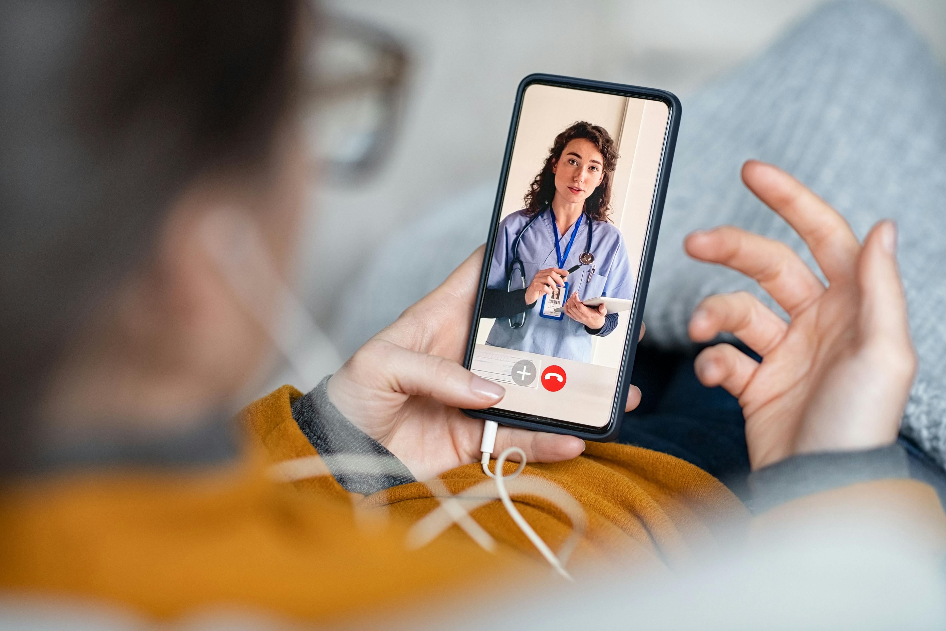 Woman on a telehealth call with a physician | Image credit: Rido - stock.adobe.com