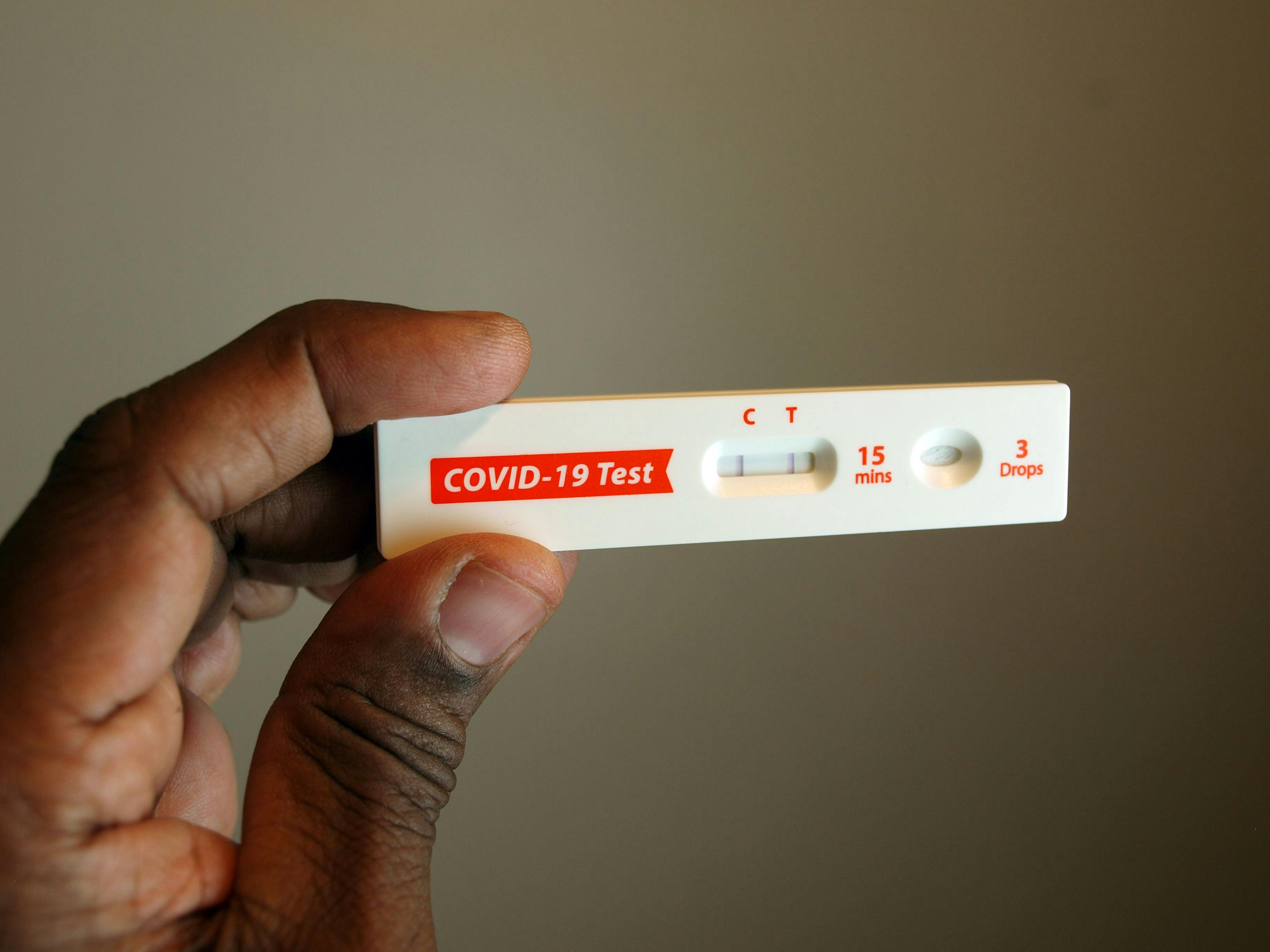 Positive COVID-19 rapid test -- Image credit: tdoes | stock.adobe.com