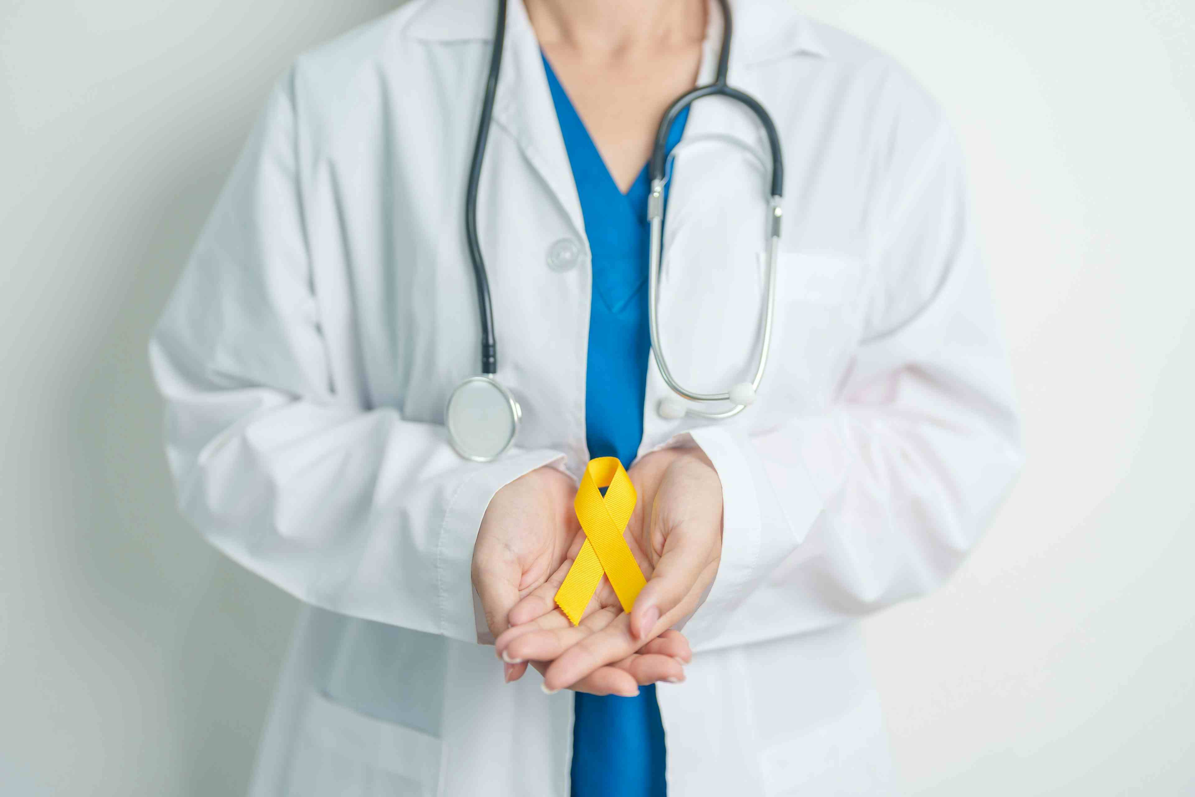 Yellow ribbon for sarcoma awareness -- Image credit: Jo Panuwat D | stock.adobe.com