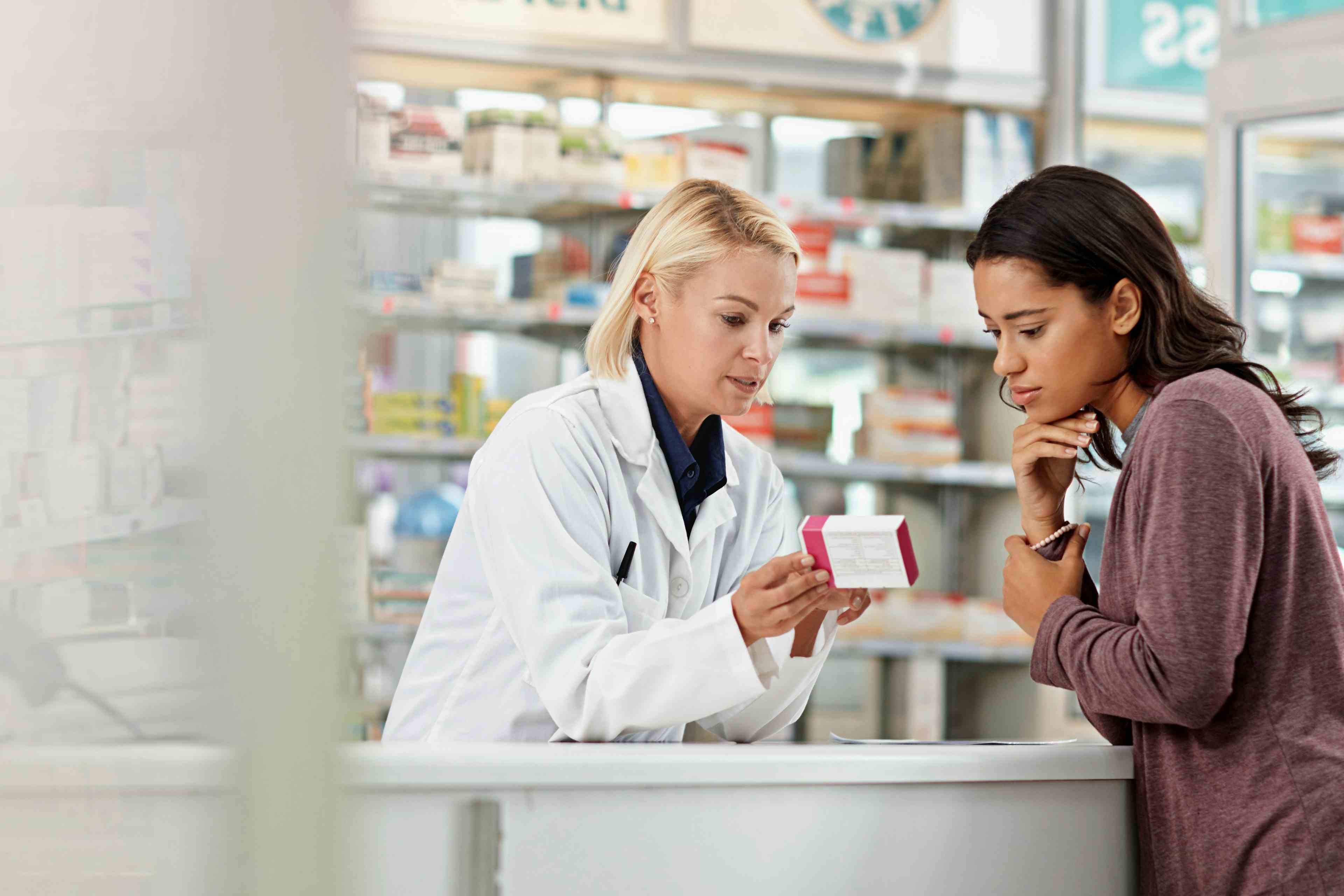 Pharmacist talking with patient -- Image credit: Reese/peopleimages.com | stock.adobe.com