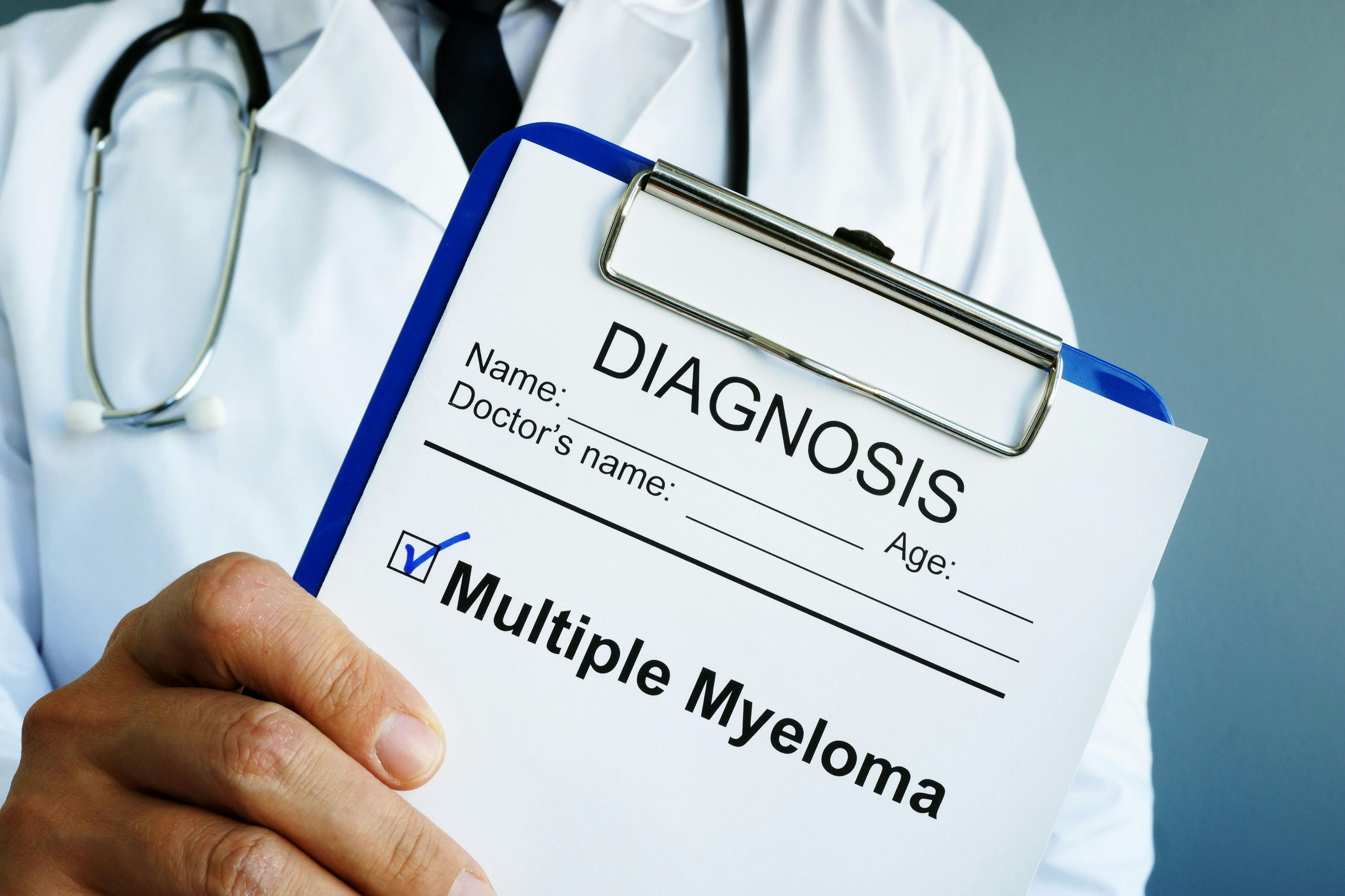 Health care provider with multiple myeloma diagnosis papers -- Image credit: Vitalii Vodolazskyi | stock.adobe.com