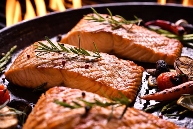 Grilled salmon and vegetables -- Image credit: amenic181 | stock.adobe.com