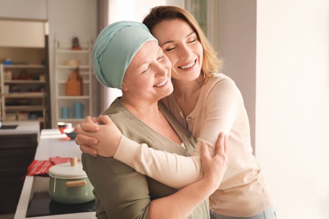 Woman with cancer and her daughter -- Image credit: Africa Studio | stock.adobe.com