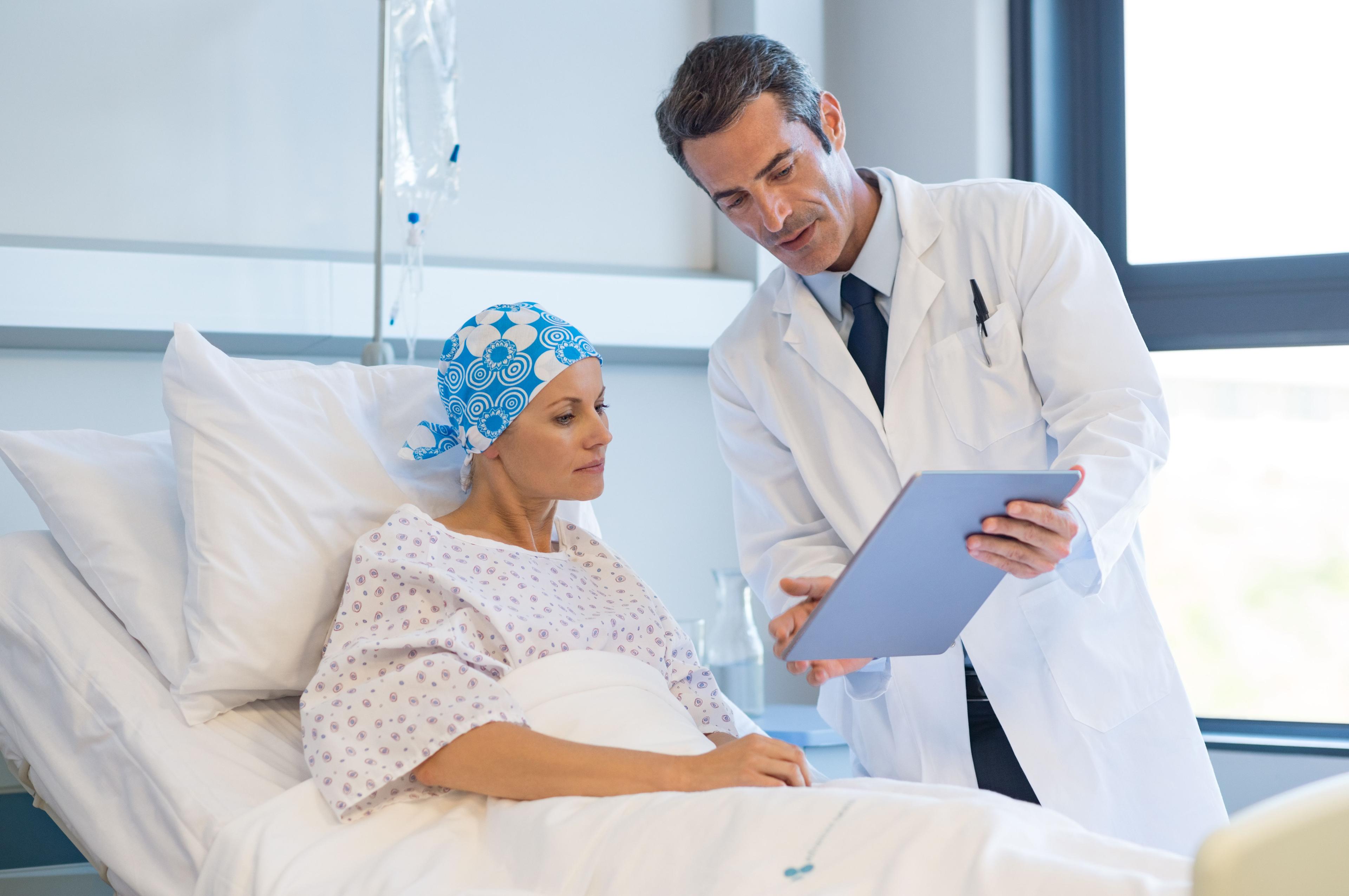 Patient receiving cancer care from provider -- Image credit: Rido | stock.adobe.com