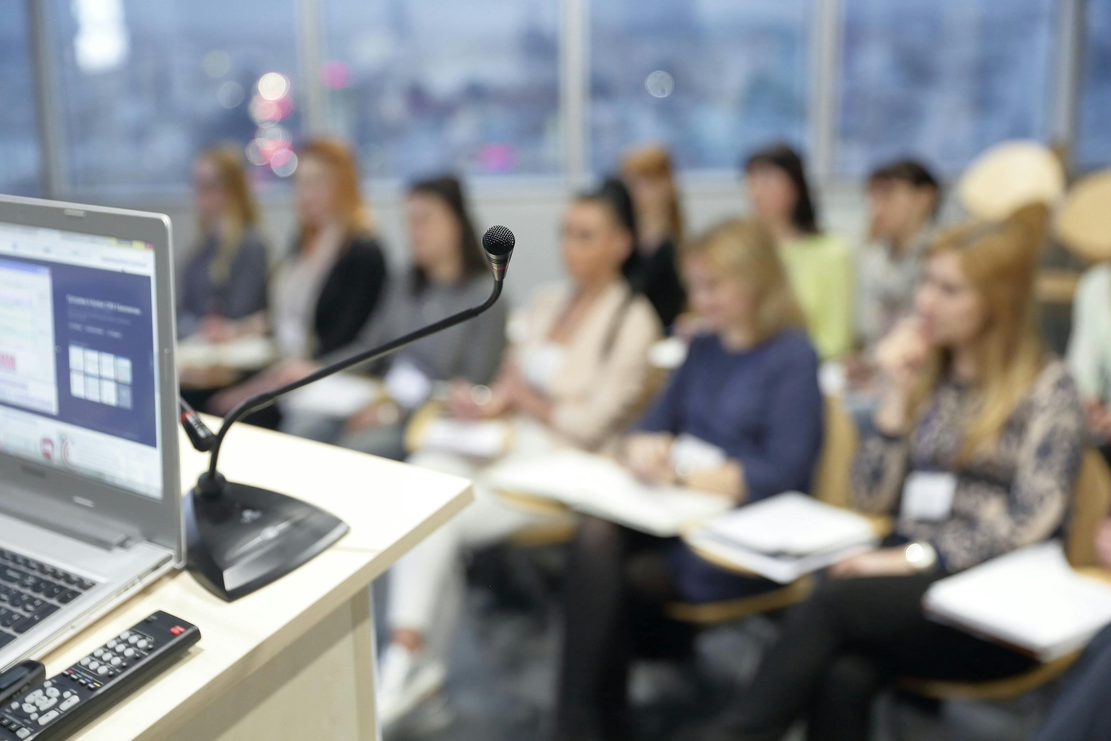 Audience sitting in a medical conference presentation -- Image credit: yurolaitsalbert | stock.adobe.com