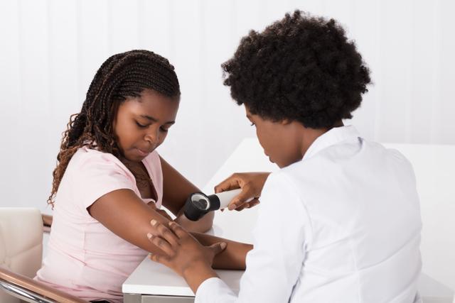 Dermatologist Checking The Child Patient Skin Image credit: Andrey Popov | stock.adobe.com 