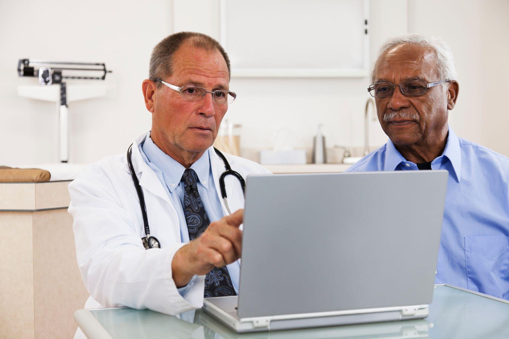 Physician talking to patient