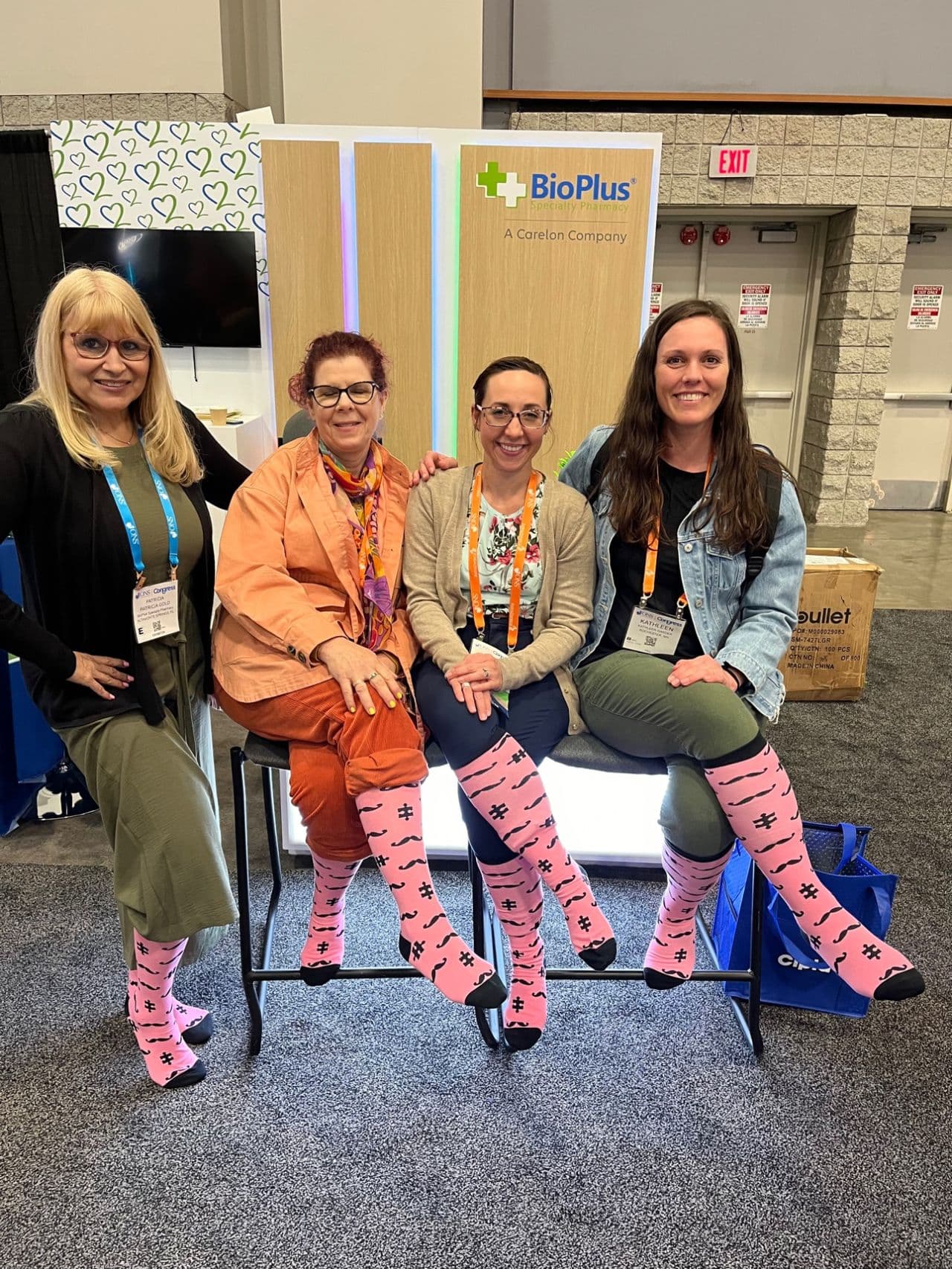 Health care workers wearing pinksocks