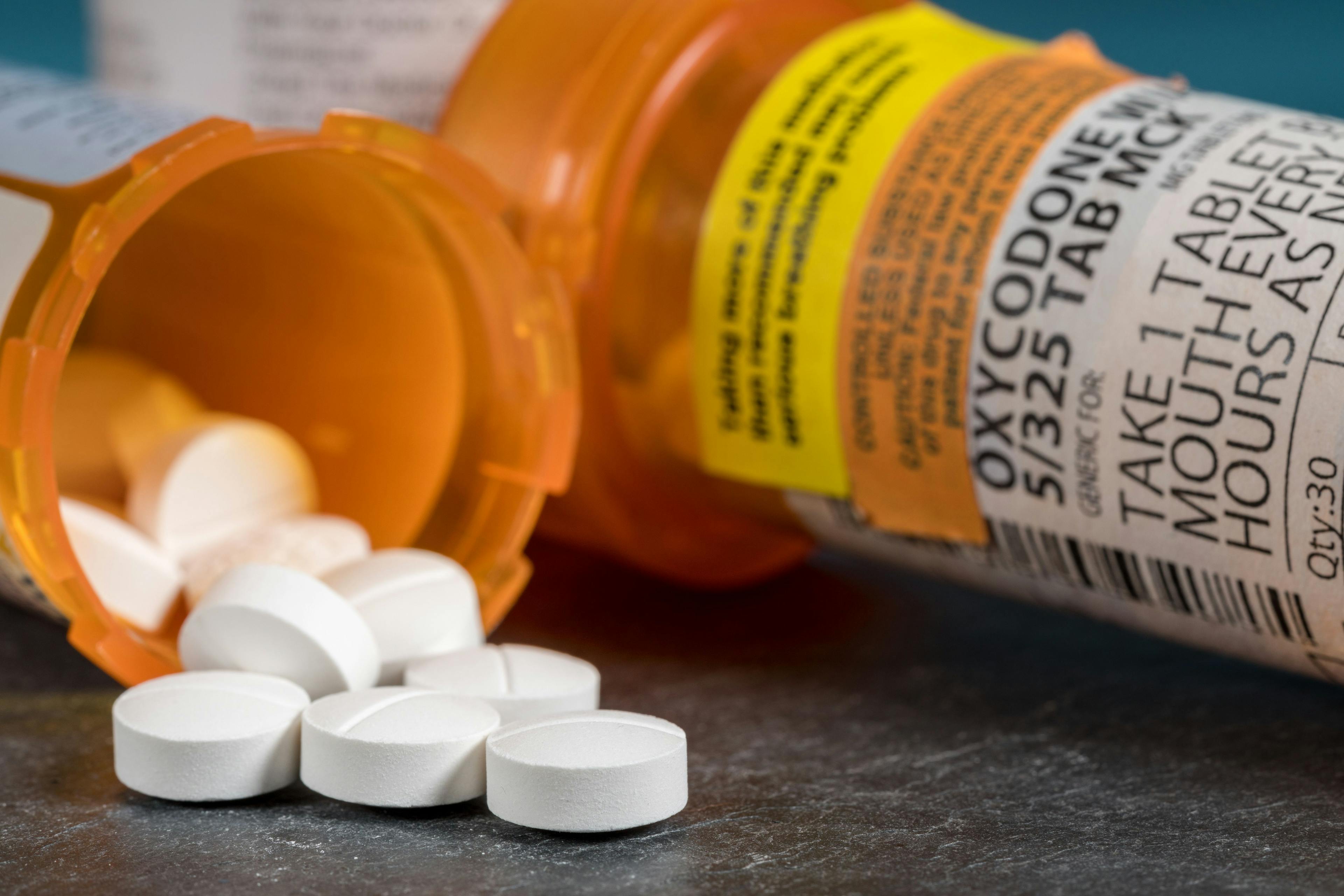 Oxycodone is the generic name for a range of opoid pain killing tablets. Prescription bottle for Oxycodone tablets and pills - Image credit: steheap | stock.adobe.com 