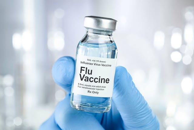 Small vial of influenza vaccine.