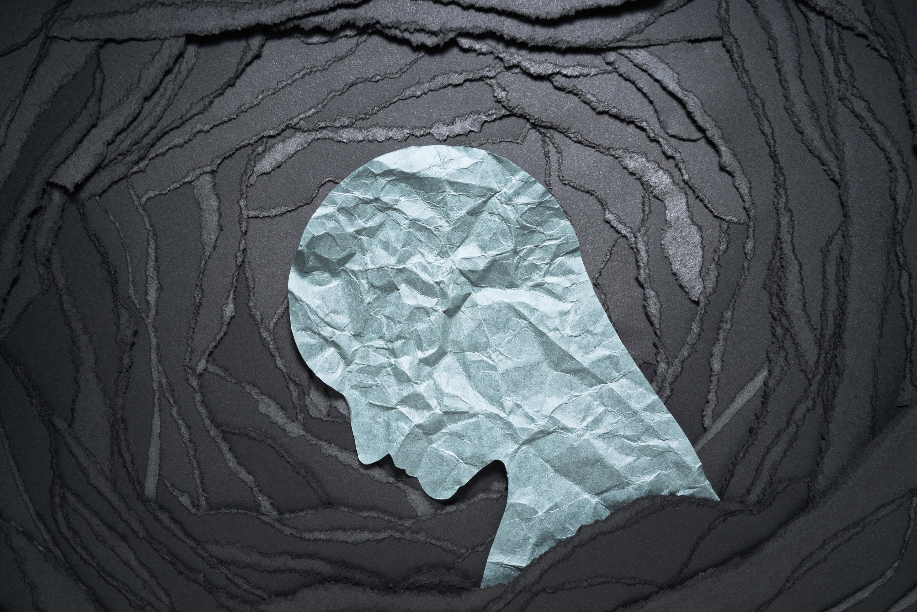 Silhouette of depressed and anxiety person head. Negative emotion image