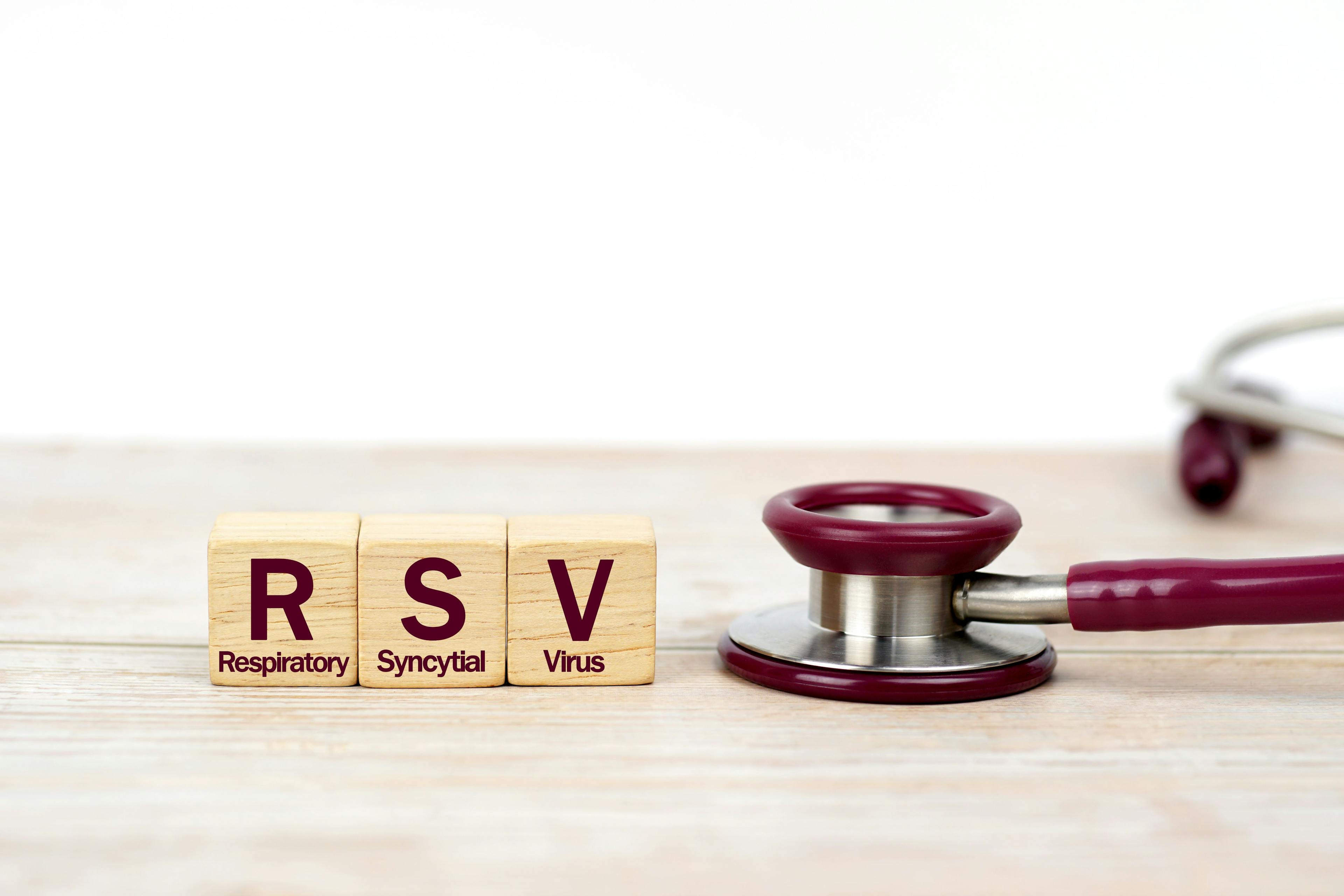 Word Respiratory Syncytial Virus (RSV) on wooden blocks and stethoscope on the wooden table with white background for copy space. Medical diagnosis and investigation technology concept - Image credit: surasak | stock.adobe.com