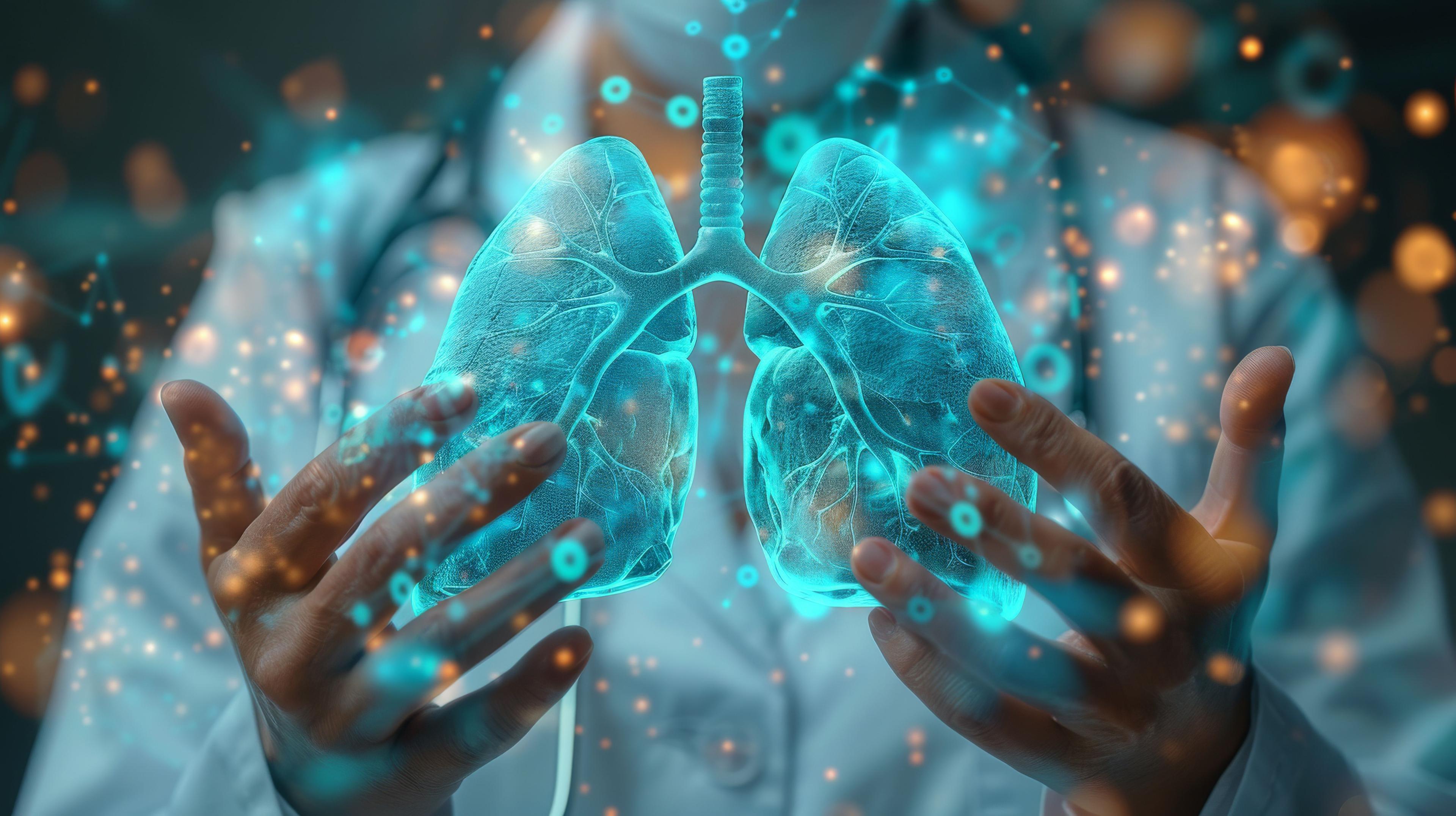 The image shows a doctor holding a pair of lungs in his hands - Image credit: pakbung | stock.adobe.com 