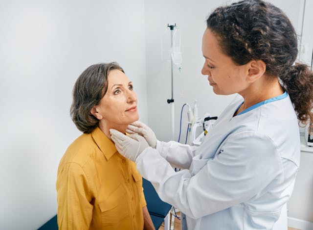 Doctor palpates of fat mature woman's neck for diagnostics of thyroid diseases and hypothyroidism at medical clinic. Thyroid treatment - Image credit: Peakstock | stock.adobe.com 