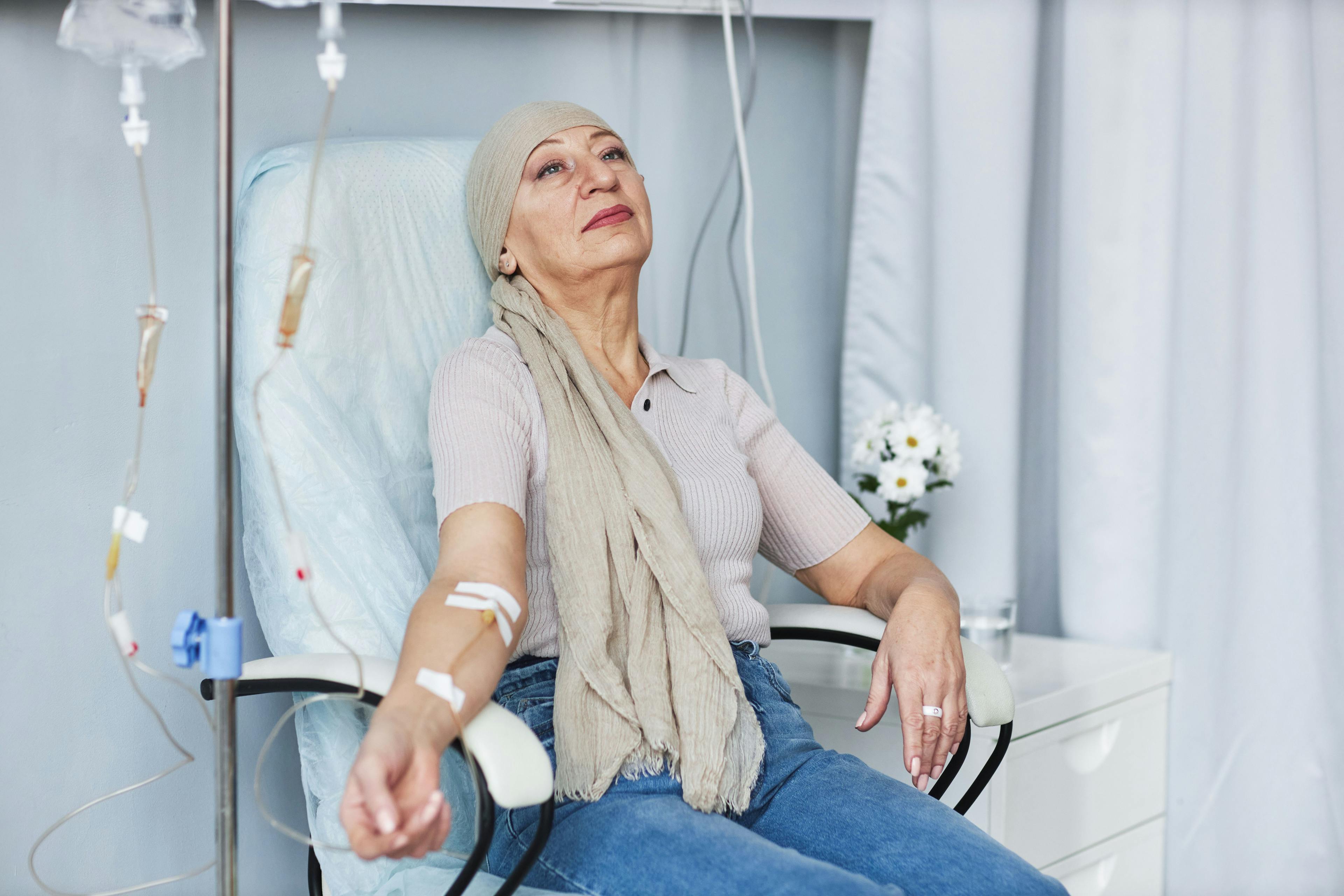 Older woman receiving chemotherapy -- Image credit: Seventyfour | stock.adobe.com