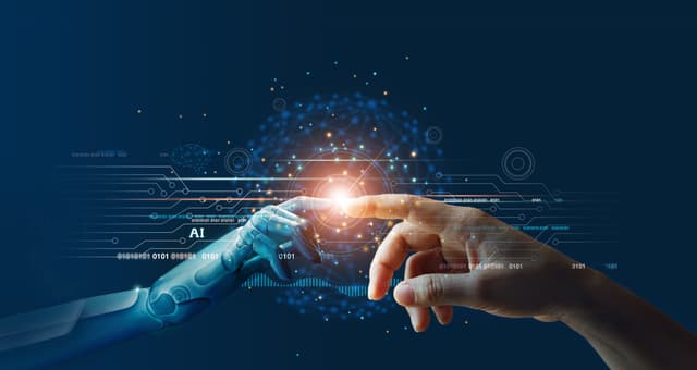 AI, Machine learning, Hands of robot and human touching on big data network connection background, Science and artificial intelligence technology, innovation and futuristic - Image credit: ipopba | stock.adobe.com