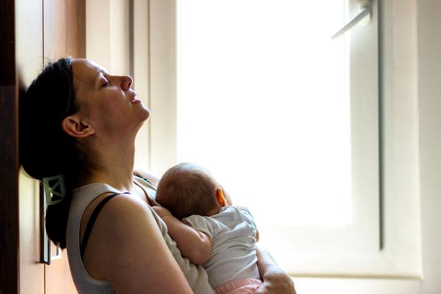 Postpartum depression -- Image credit: Jelena Stanojkovic | stock.adobe.com