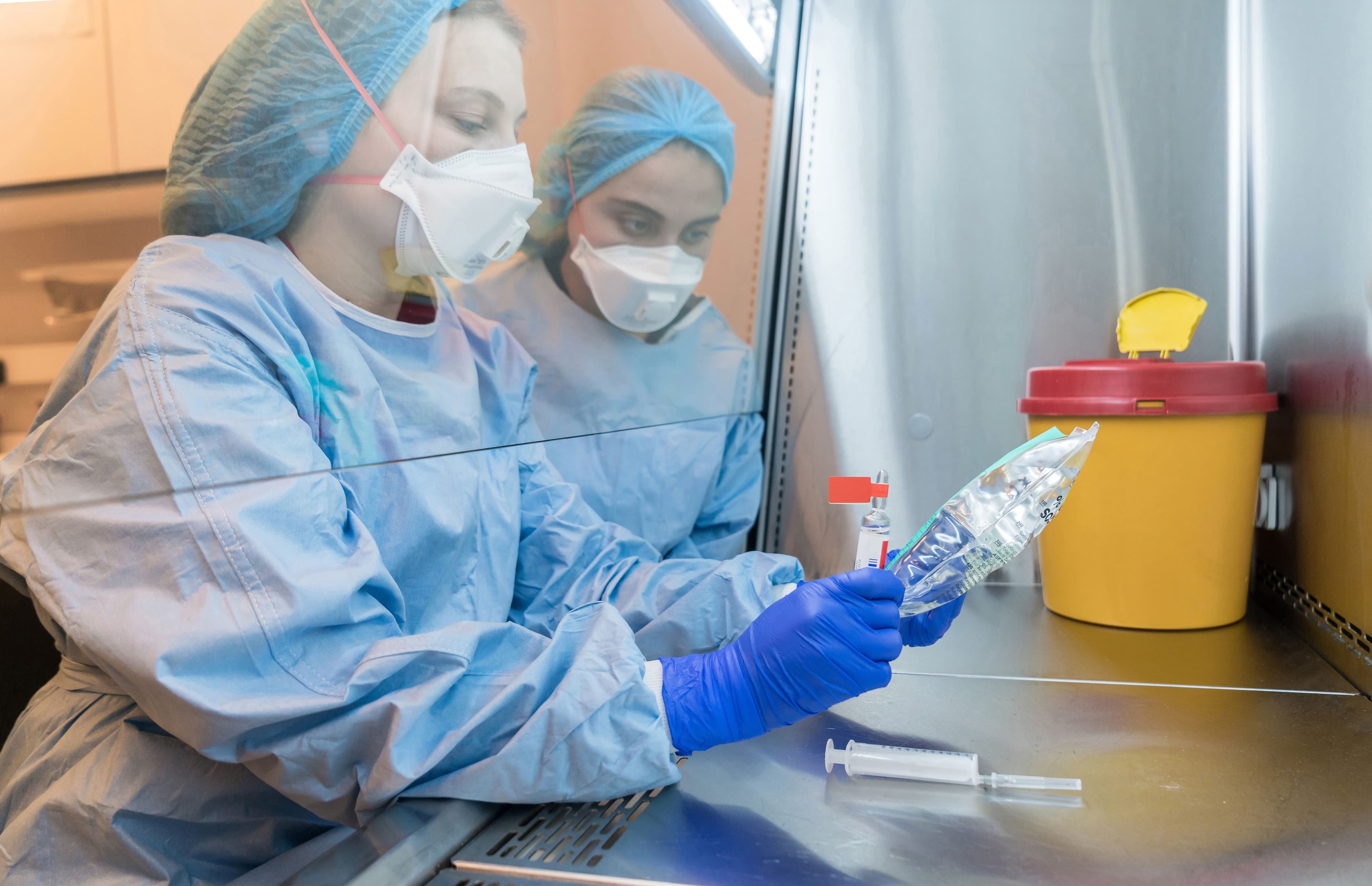 Oncology pharmacist preparing chemotherapy -- Image credit: HealthyShot | stock.adobe.com